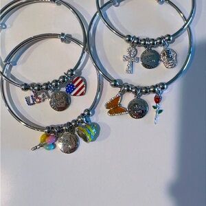 Brand New Charm Bracelets $22 for all 4